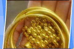 黄金有白点是否假的_黄金首饰出现白点黄金上有白点
